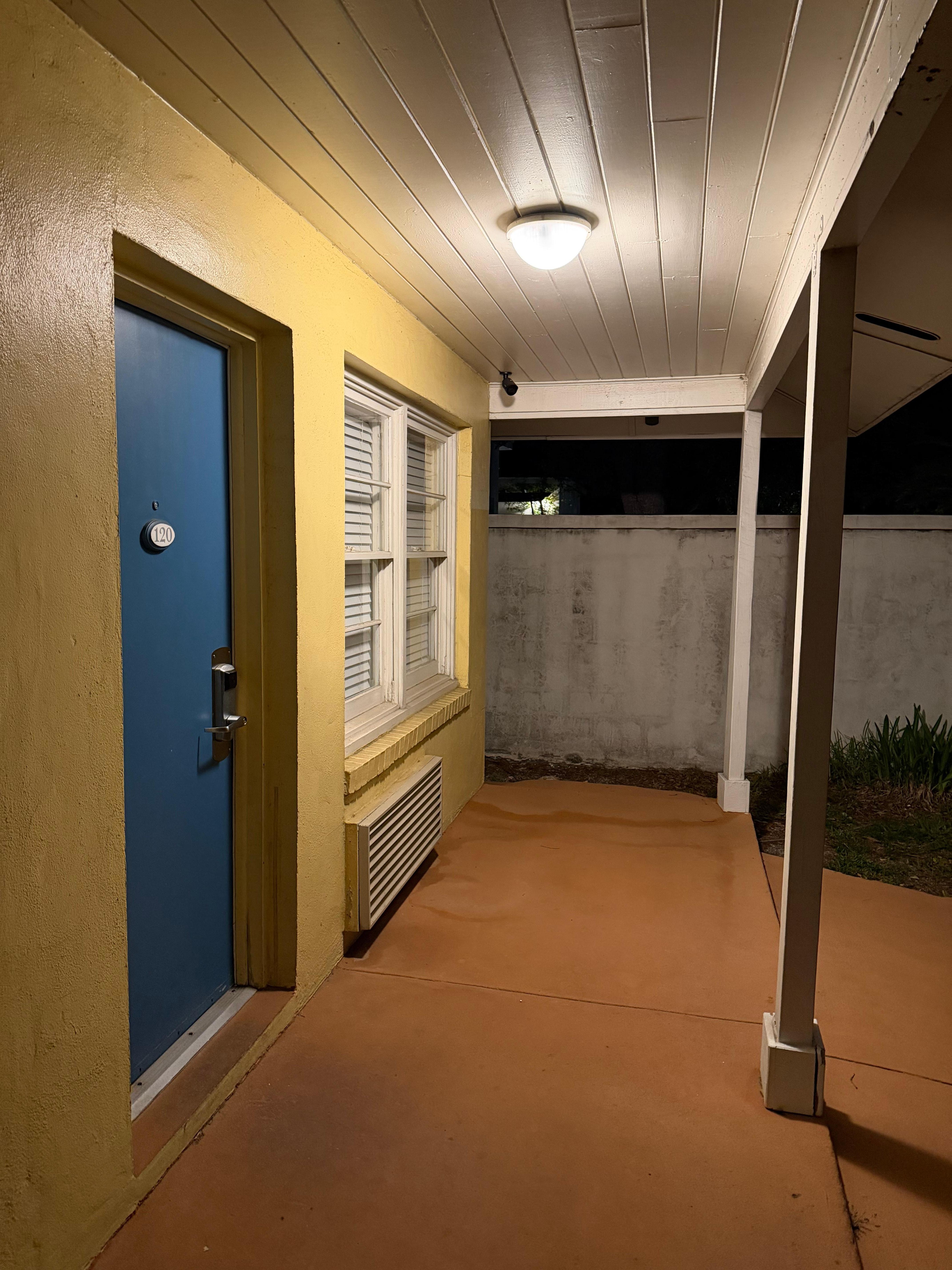The street side rooms have light situated right above the room windows and are bright inside at night.