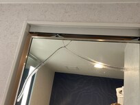 Broken sliding mirror bathroom door