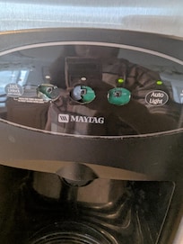 Refrigerator ice and water dispenser