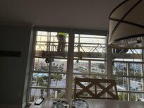 The view out our living room window due to painting of complex..