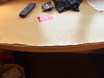 Edge of desk.