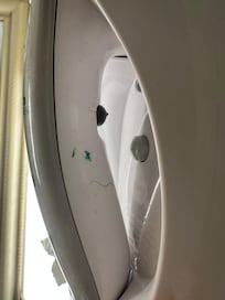 Hair dryer with gross hair and blue/ green goo