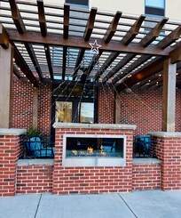 A firepit with seating on a cold night