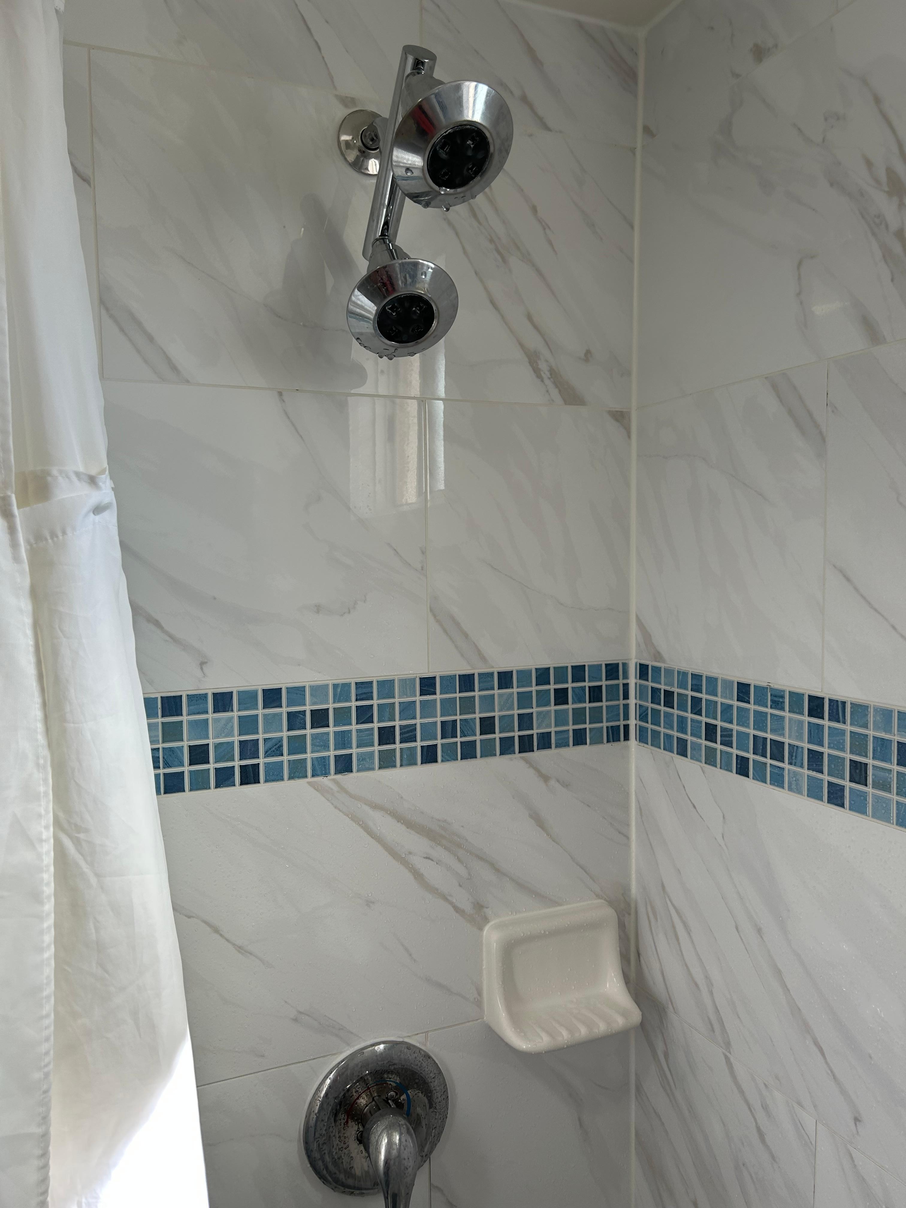 2 shower heads ?
Not enough pressure for even one!