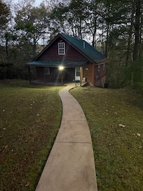 The Wildflower cabin at night.