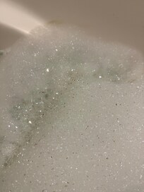 Zoom in. You can see the flecks in the bubbles.
