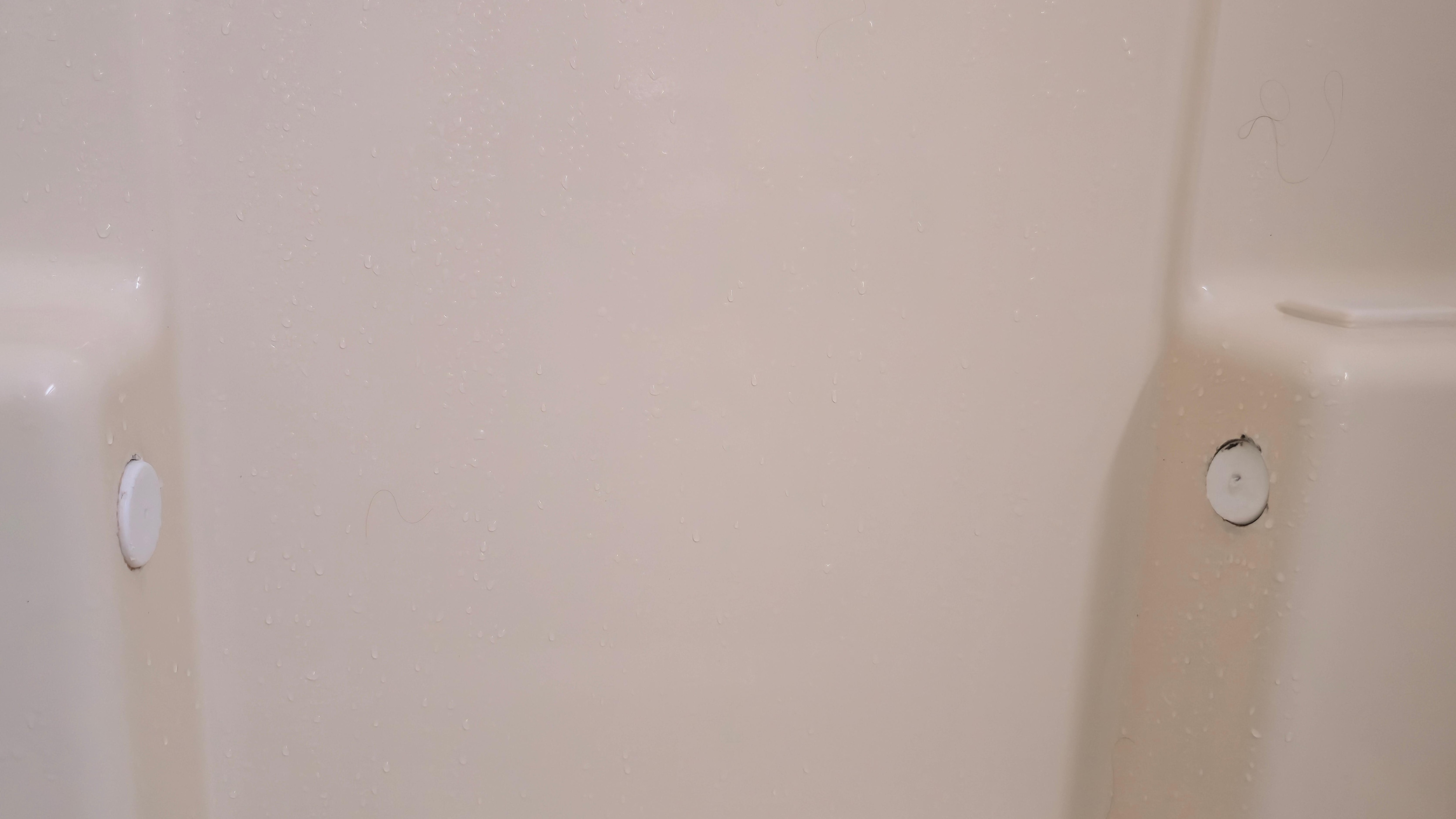 Place where shower handle was removed and hole was not properly covered so that water couldn't get in.