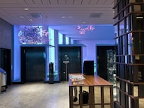 Revolving floral design around elevator