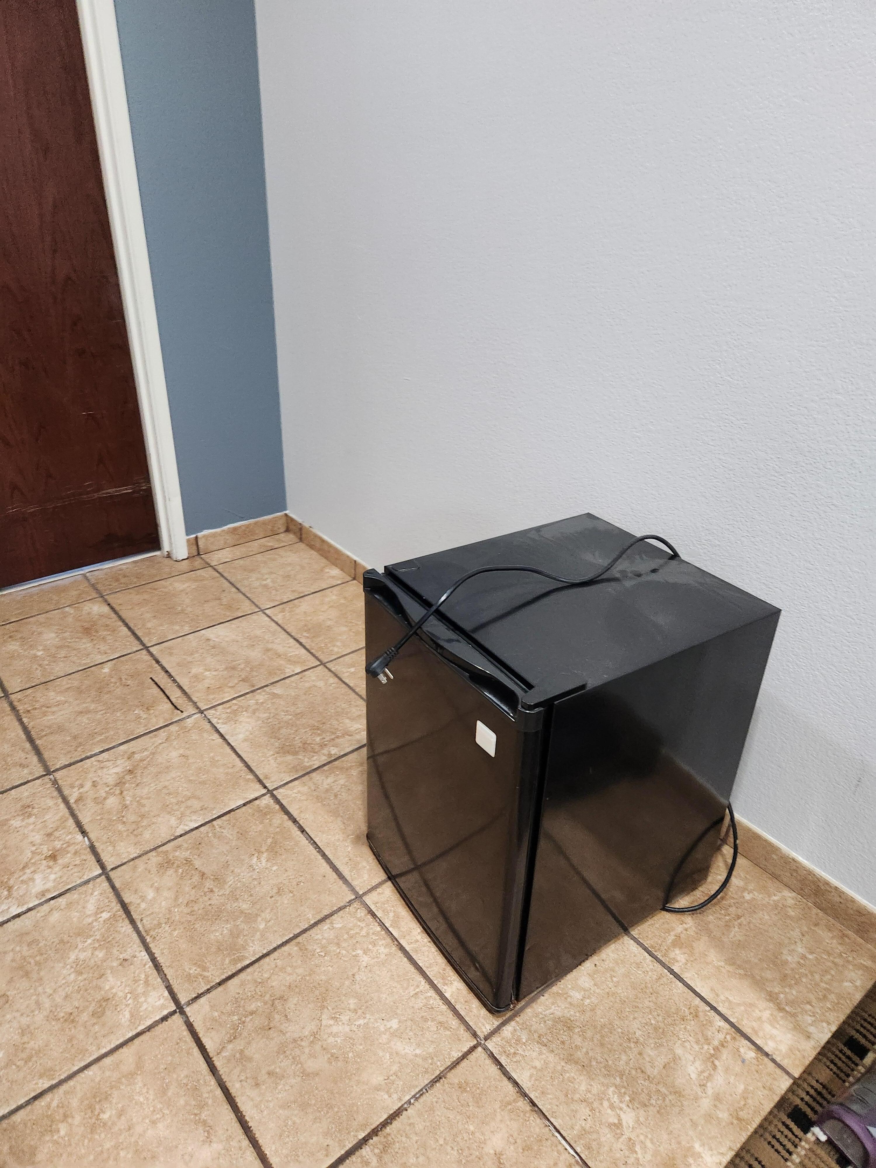 The broken refrigerator.