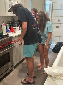 Helping Uncle figure out the stove