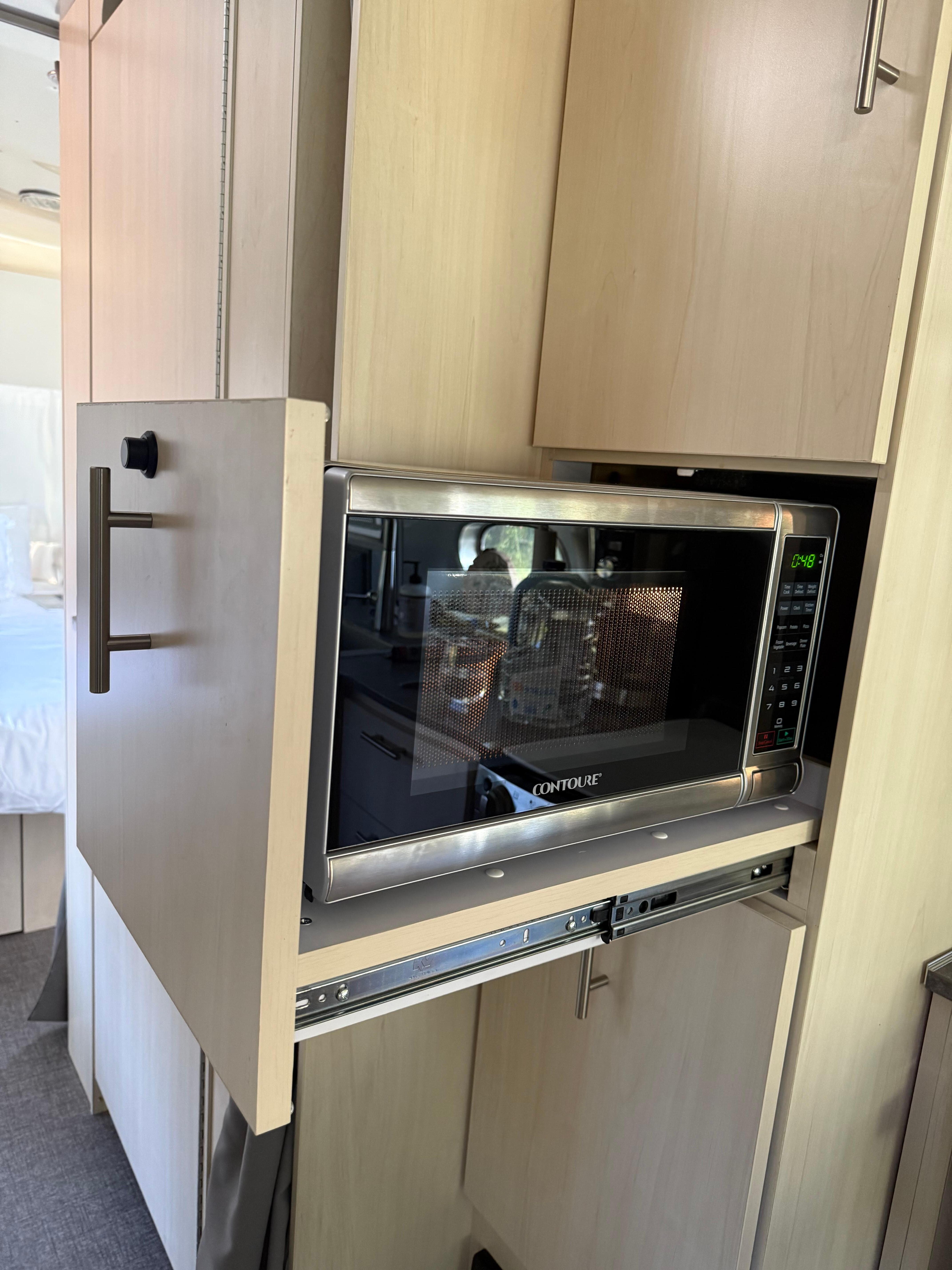Pop out microwave