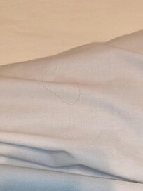 More hair throughout the bed. Has to remove all linen and wash them