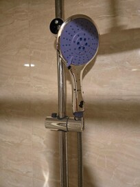 Broken shower. Water was leaking from the different parts