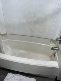 The shower, paint peeled off and was placed in the cubby hole to the left