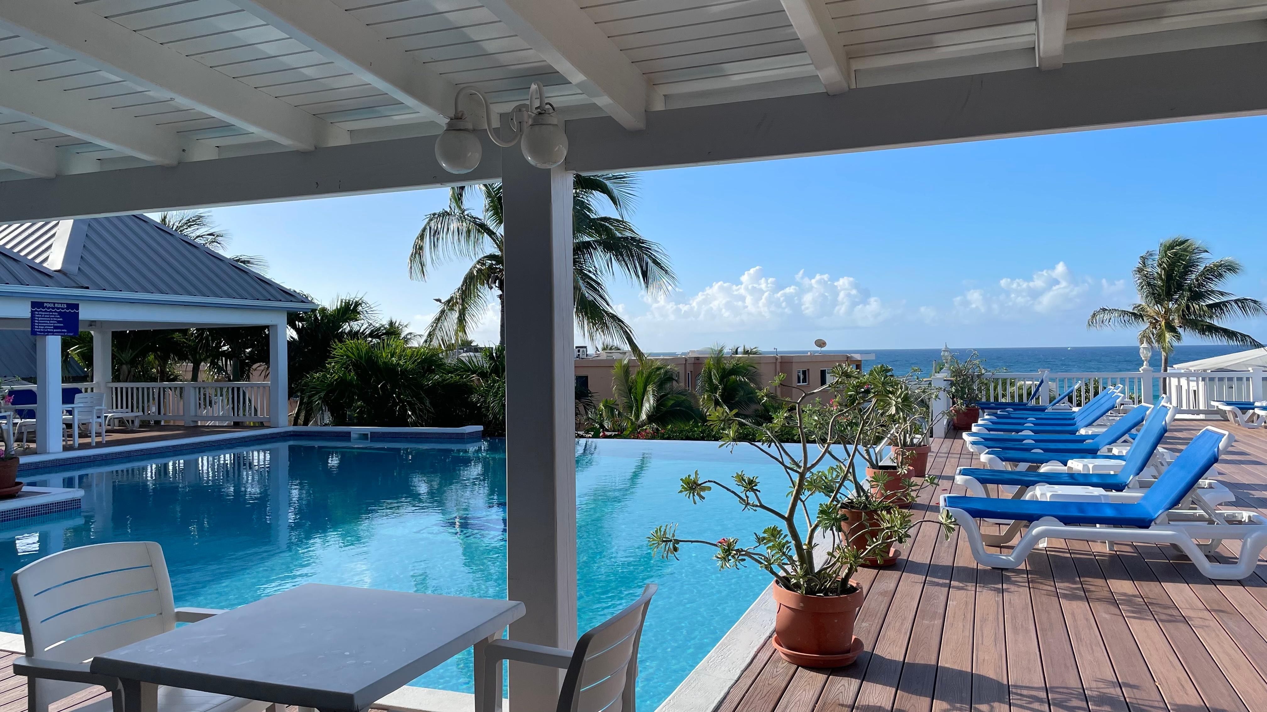 The larger pool up higher by the restuarant.