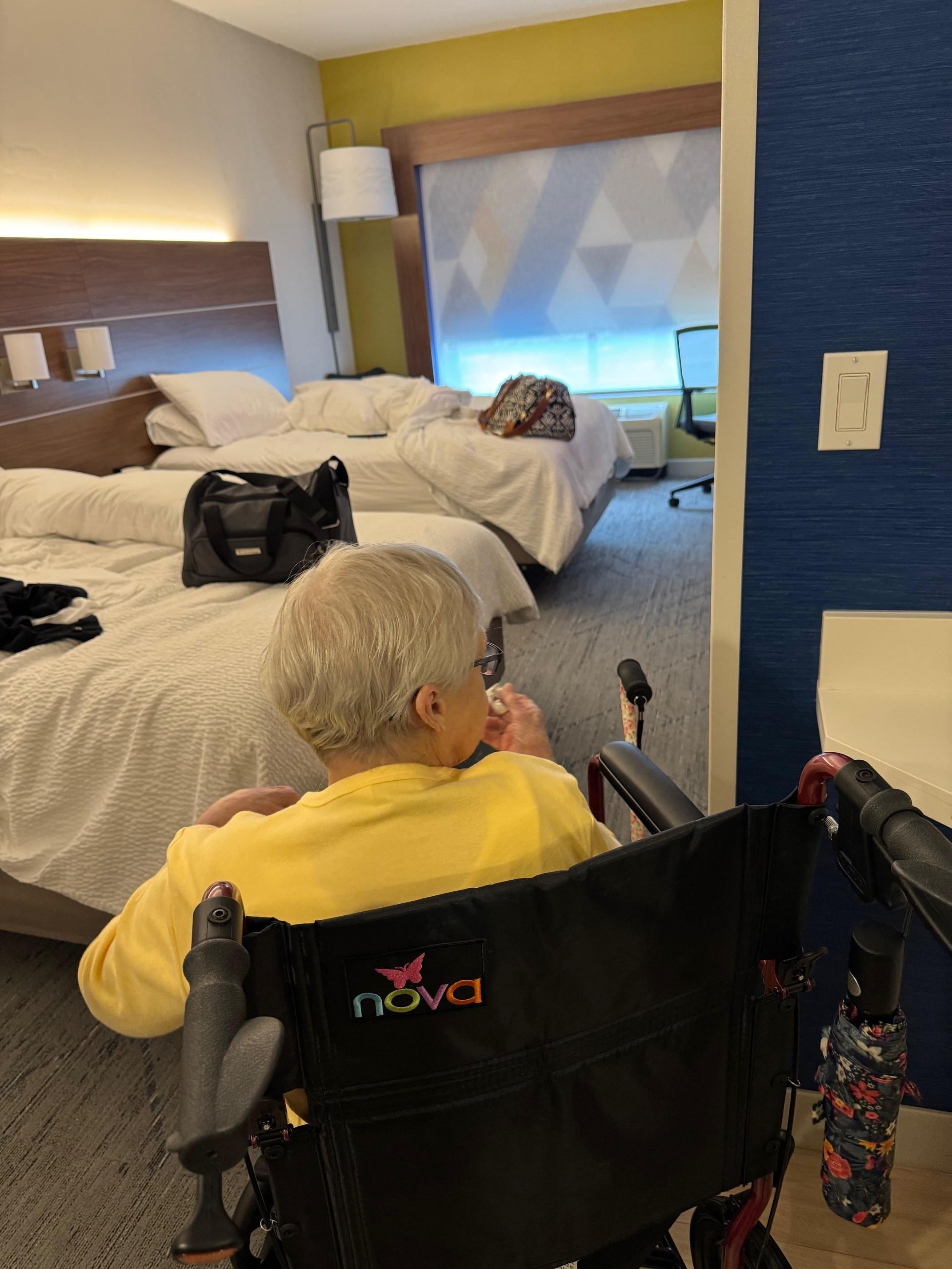 Size of wheelchair and size of space between the bed and the wall.