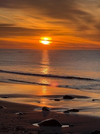 Sunrise over ocean near the house.