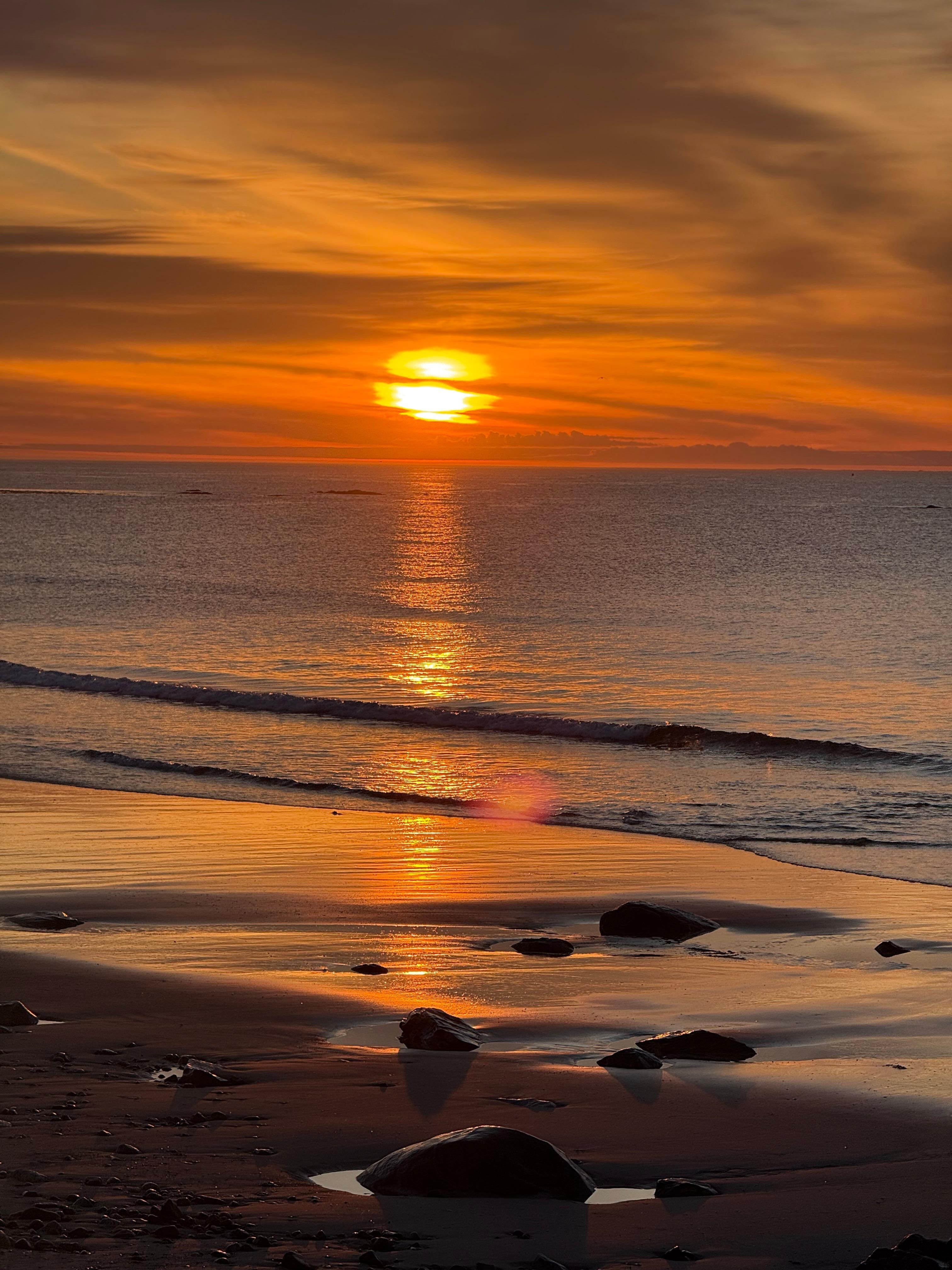 Sunrise over ocean near the house. 