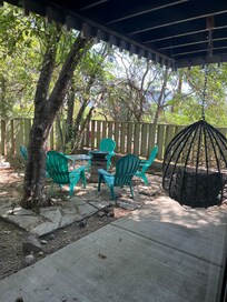 Backyard sitting area and fire pit.