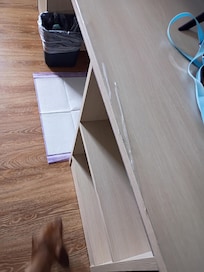 Broken and taped TV Stand