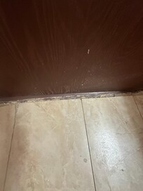 Doorway into room had grout crumbling and missing
