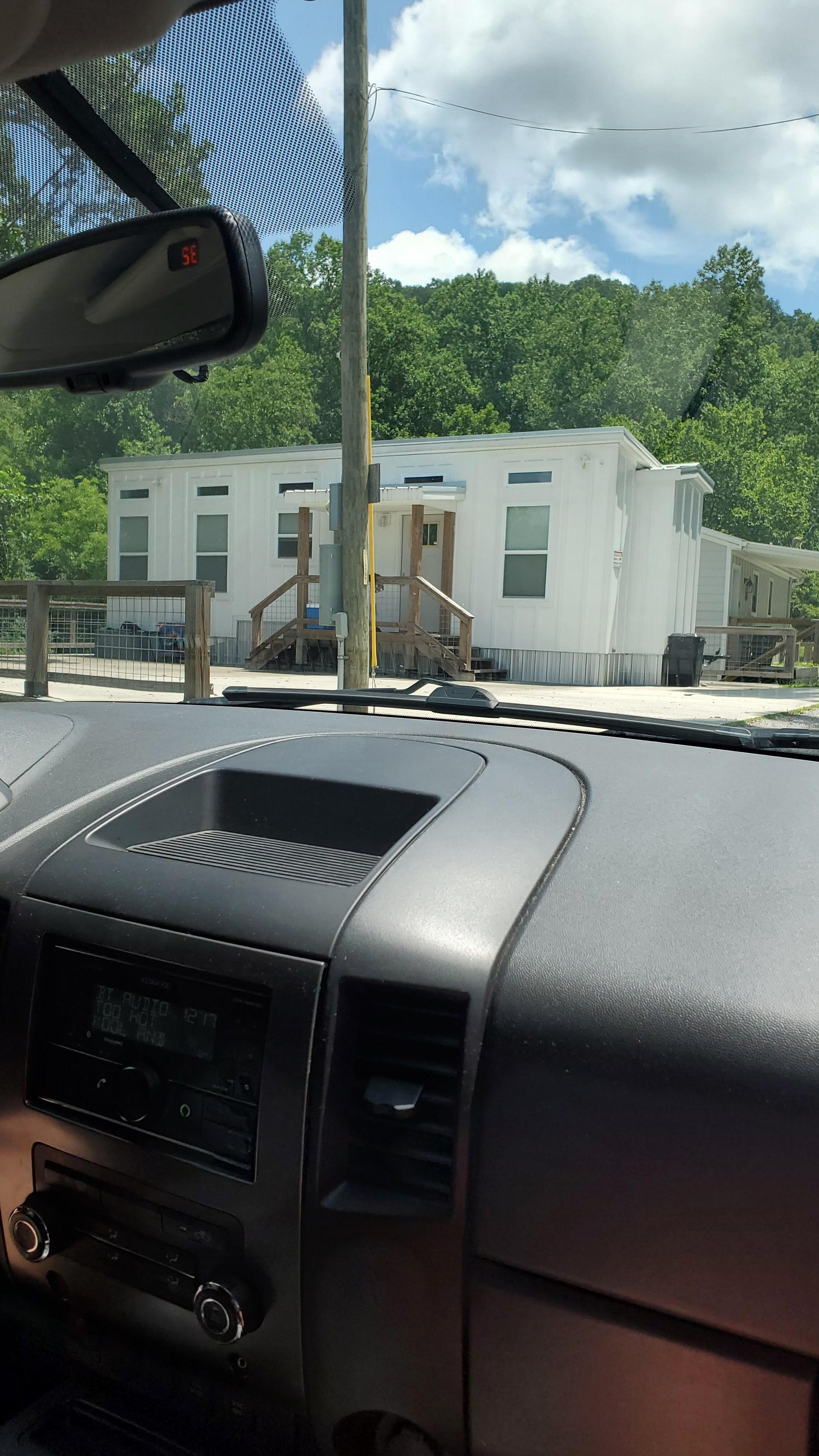 Driving up to the house. 
