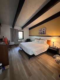 Our room. Only one bedside lamp. There as a desk lamp and a light by the door