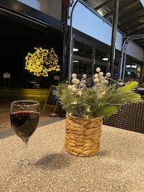 A complimentary wine for spending $10 or more. A nice ambiance night at the cafe.