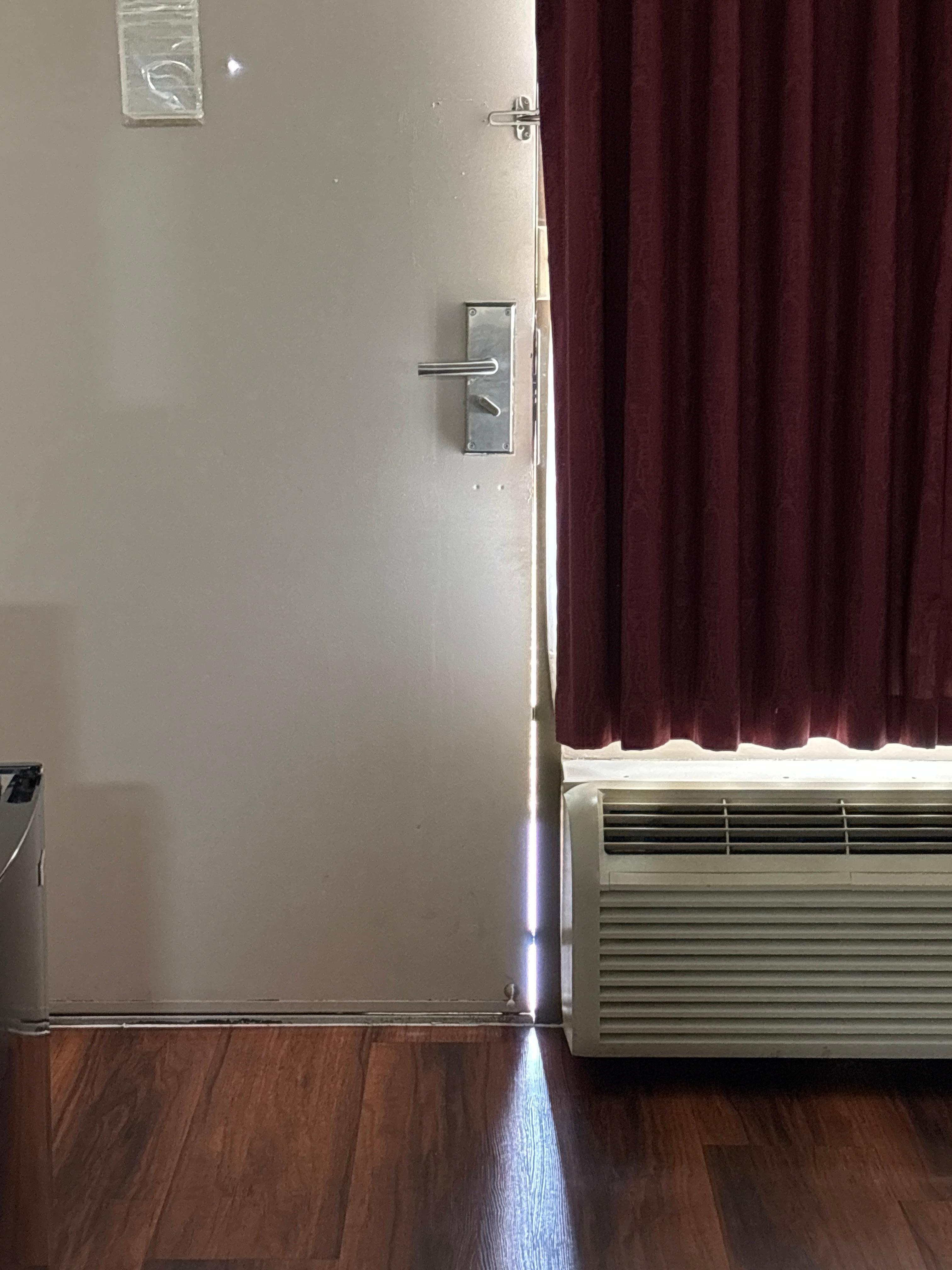 There is a crack in the door seal that let’s in smells and light