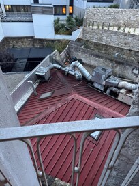 The view and noisy equipment off the balcony.