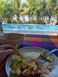 View while eating breakfast by the pool