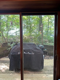 Shared access directly out dining window with no privacy shades available