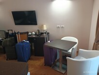 Table chairs fridge Tv