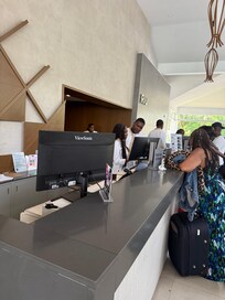Nine employees behind the counter one line open
