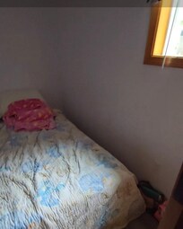 No walk space, hard bed low to ground