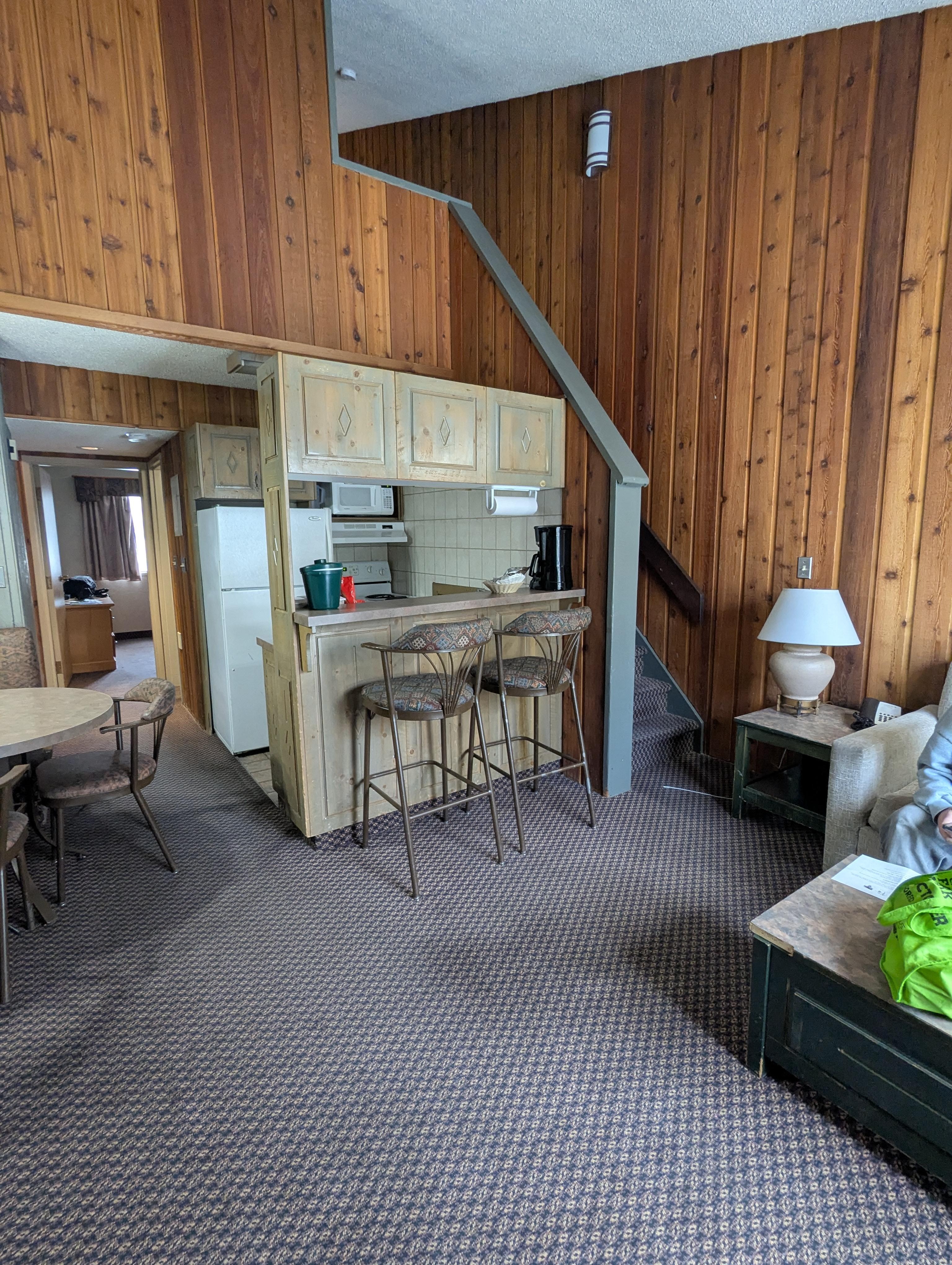 Duplex suite. Upstairs loft with 2 double beds and half bath, foldout couch in livingroom and a separate queen sized bedroom with tv on main floor. 