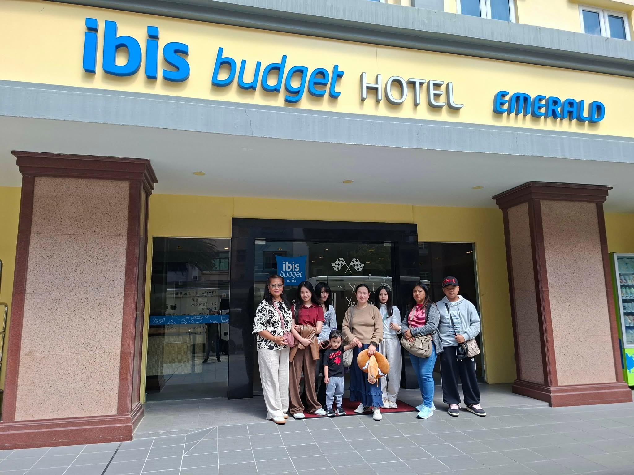 Infront of the hotel. 