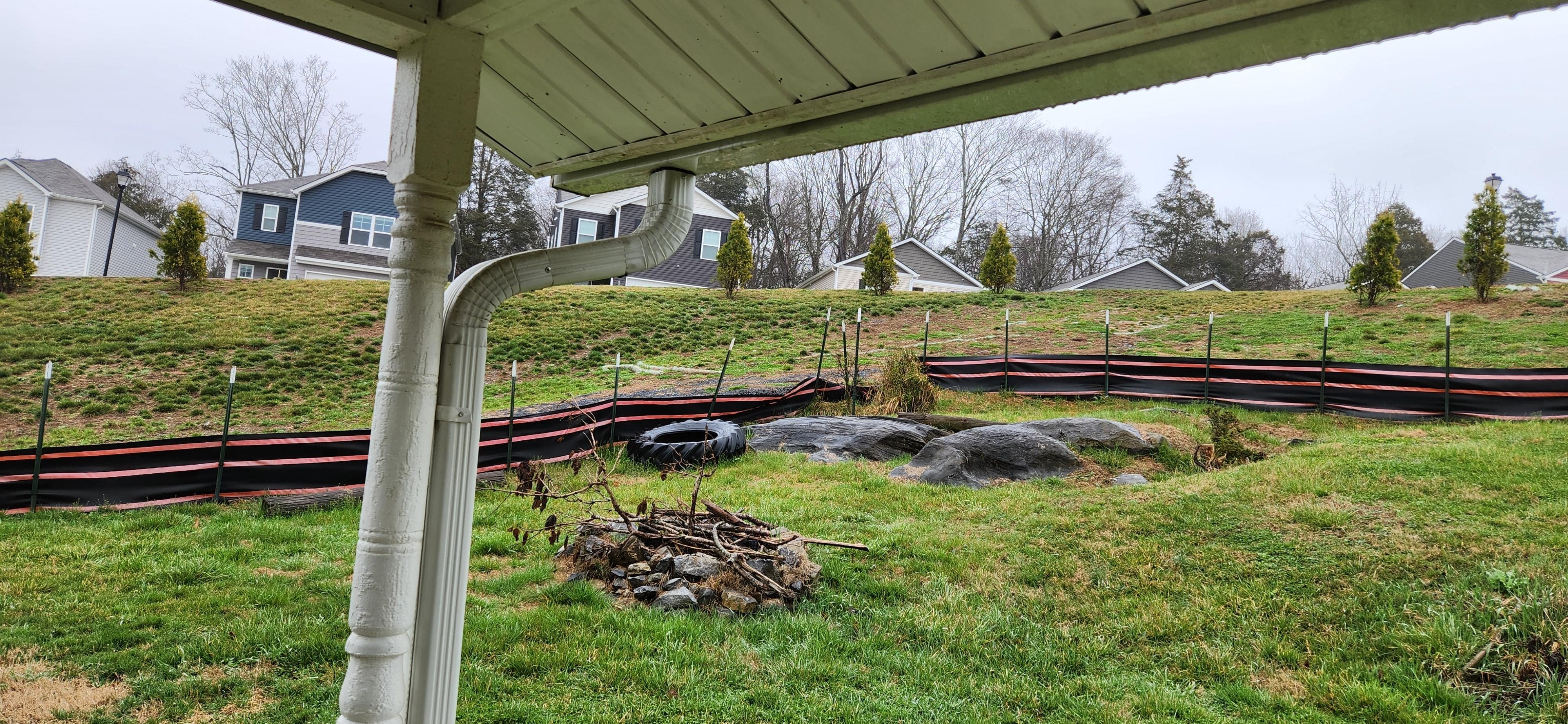 There is a subdivision/neighborhood directly behind the house.