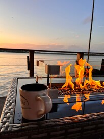 Watching the sunrise drinking a fresh cup of good ole joe (she had a bean grinder)