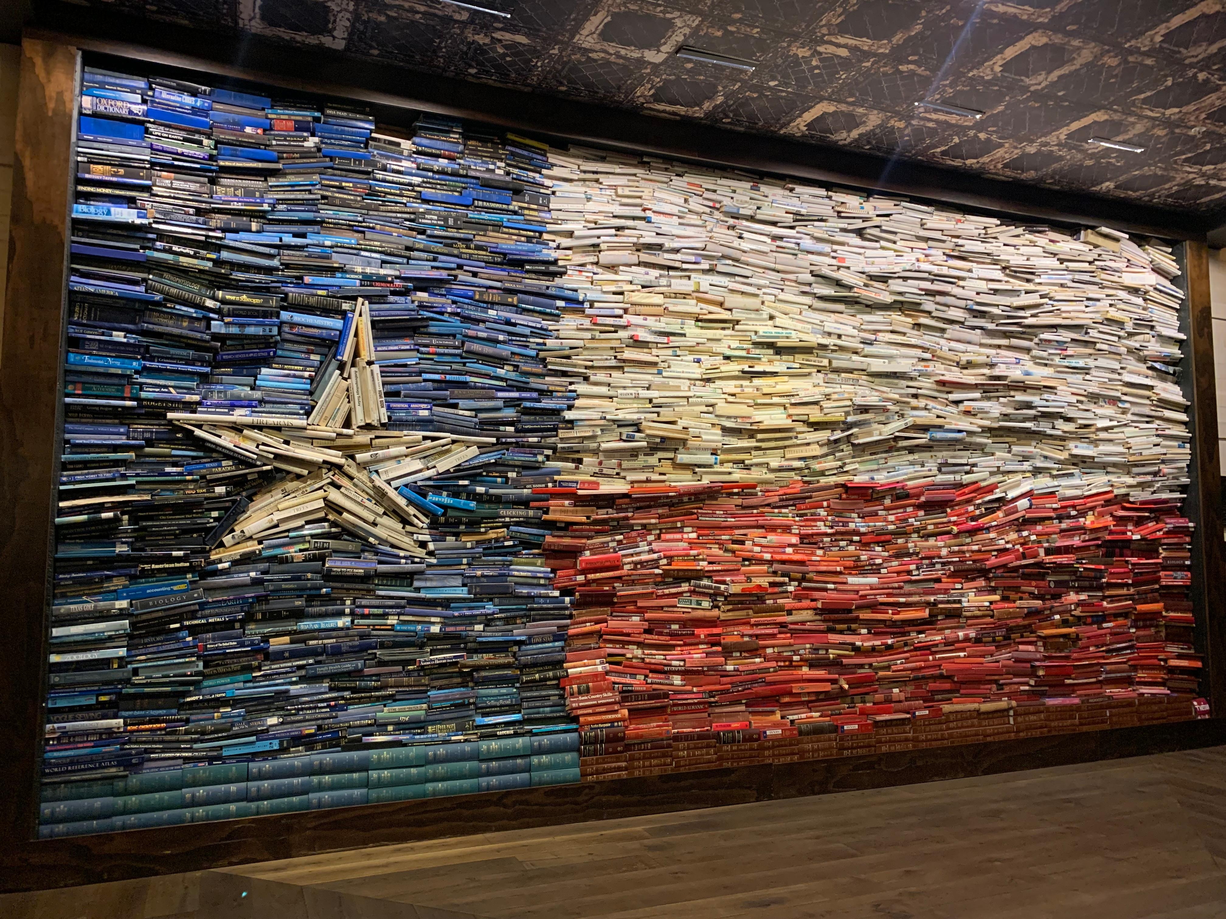 Book wall in lobby. 