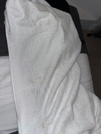 brown smear stains on towel
