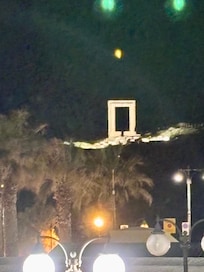 View of Temple of Apollo at night from balcony