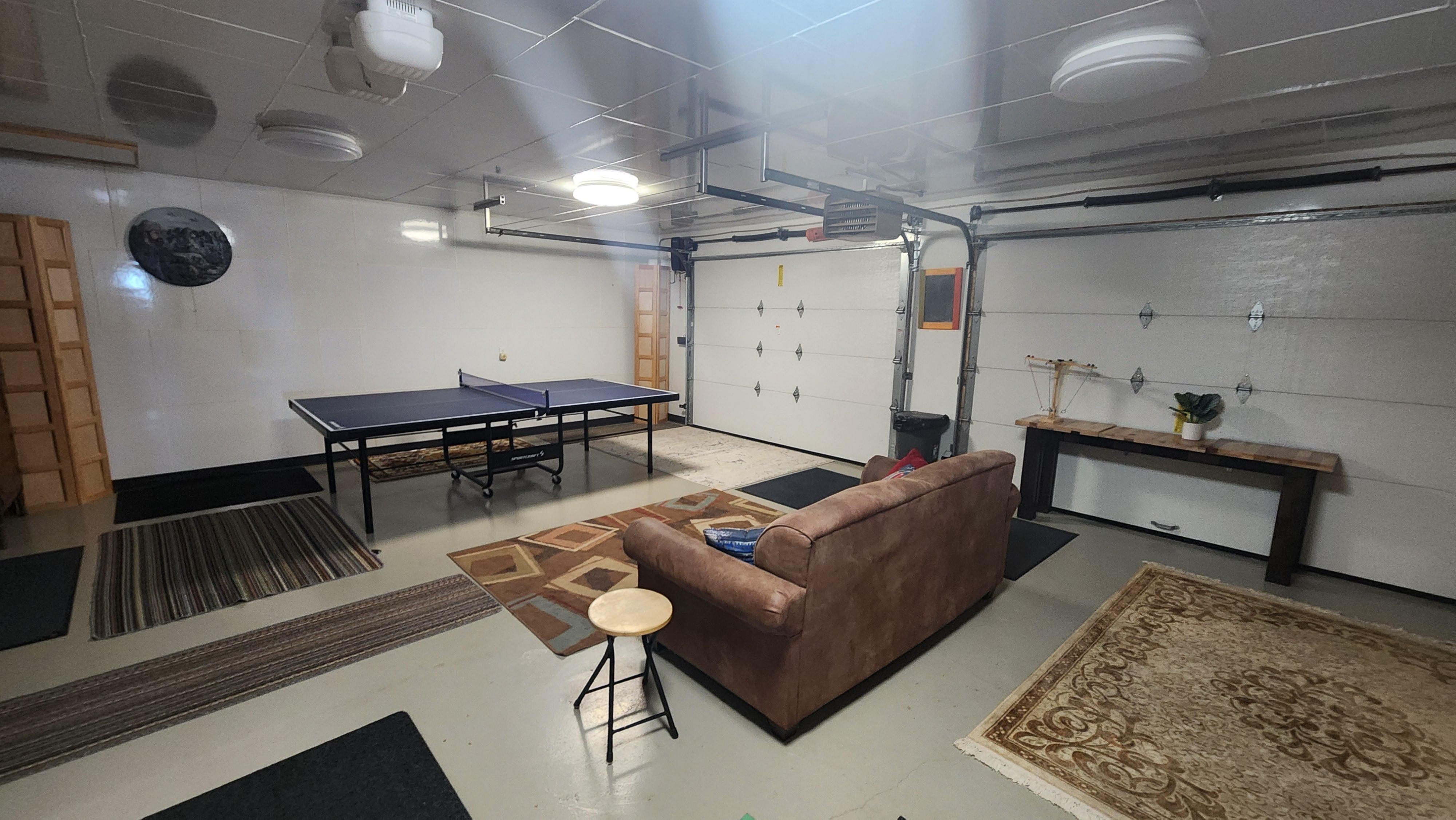 Garage recroom with ping pong table 