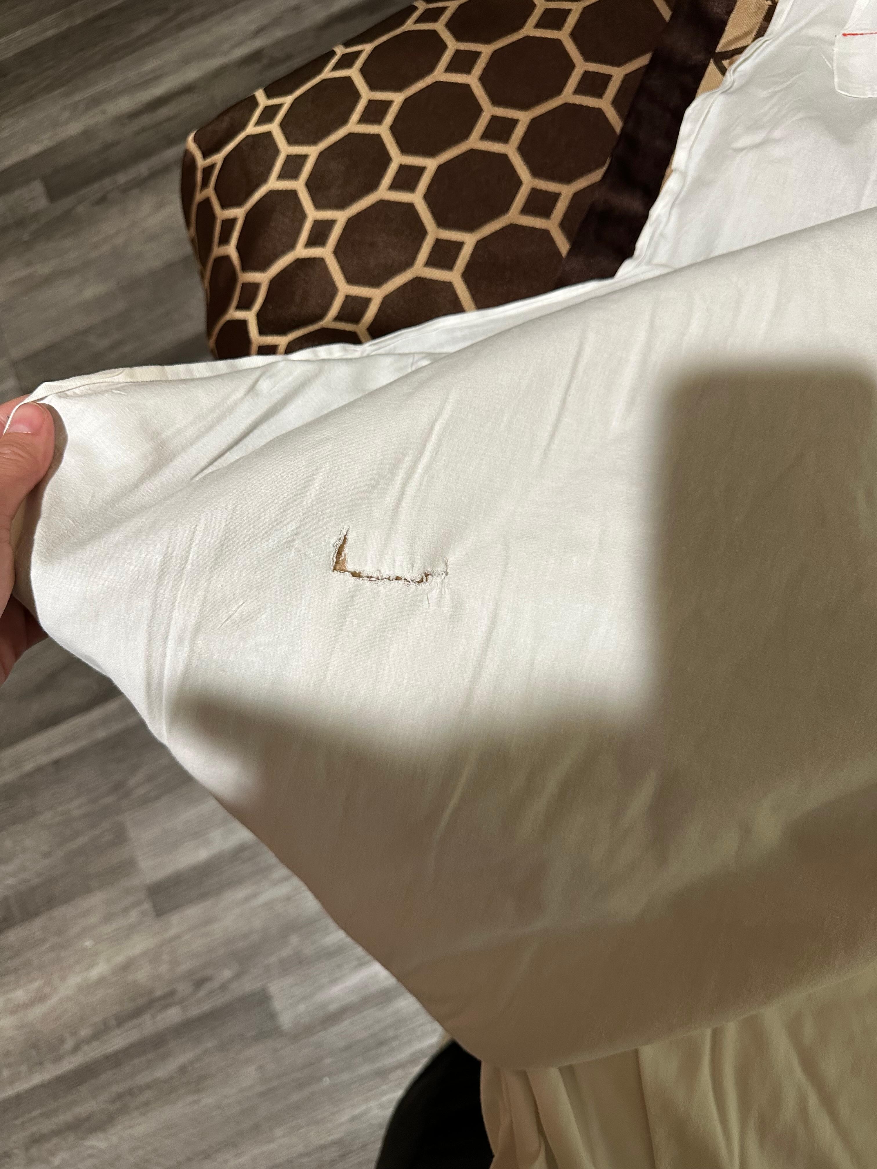 Rips and stains on sheets 