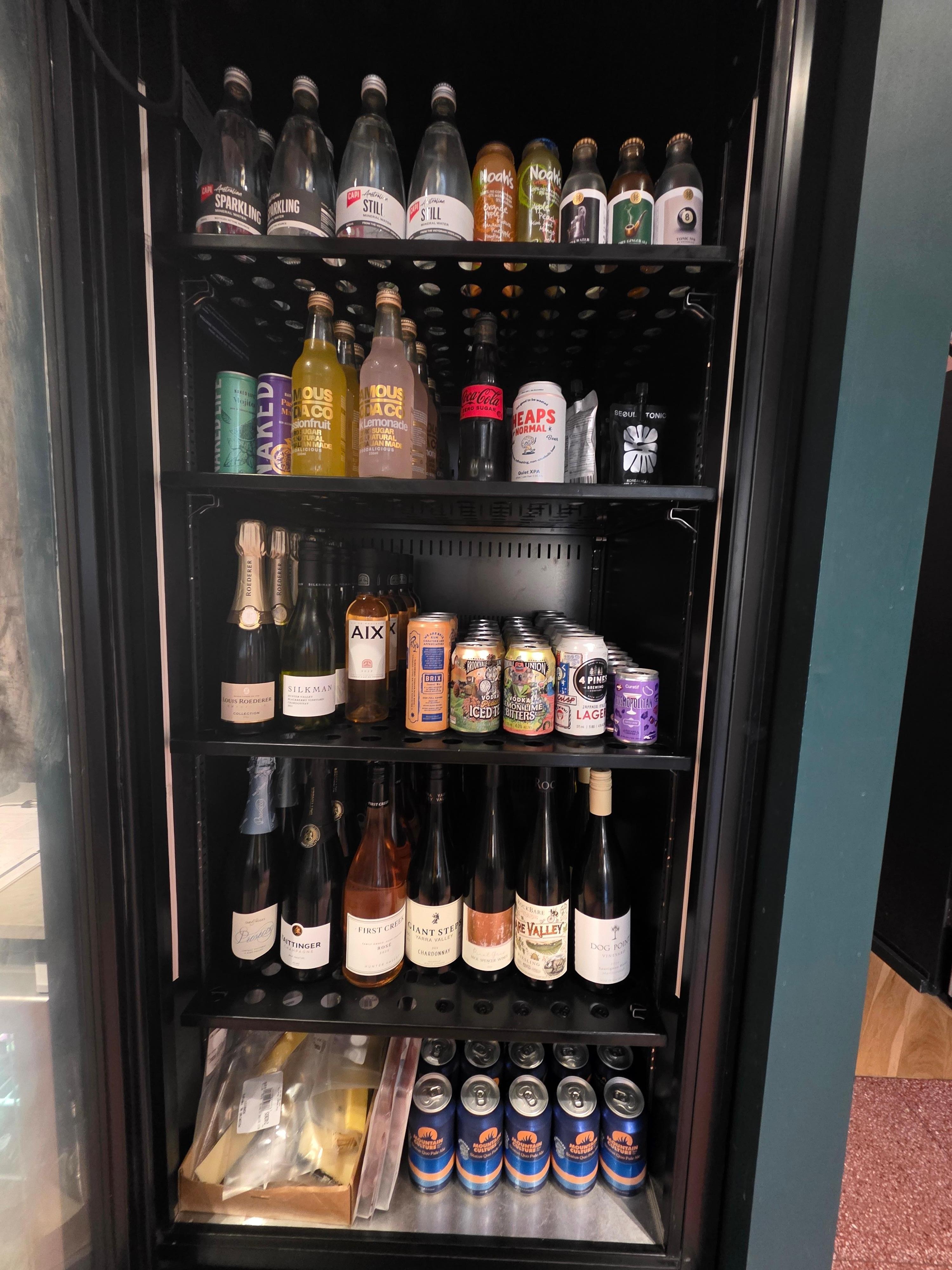 The fridge in honesty bar is well stocked.