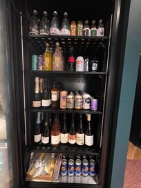 The fridge in honesty bar is well stocked.