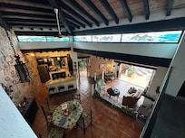 A view from the upstairs balcony. The dolphin glass is one of many fine details.