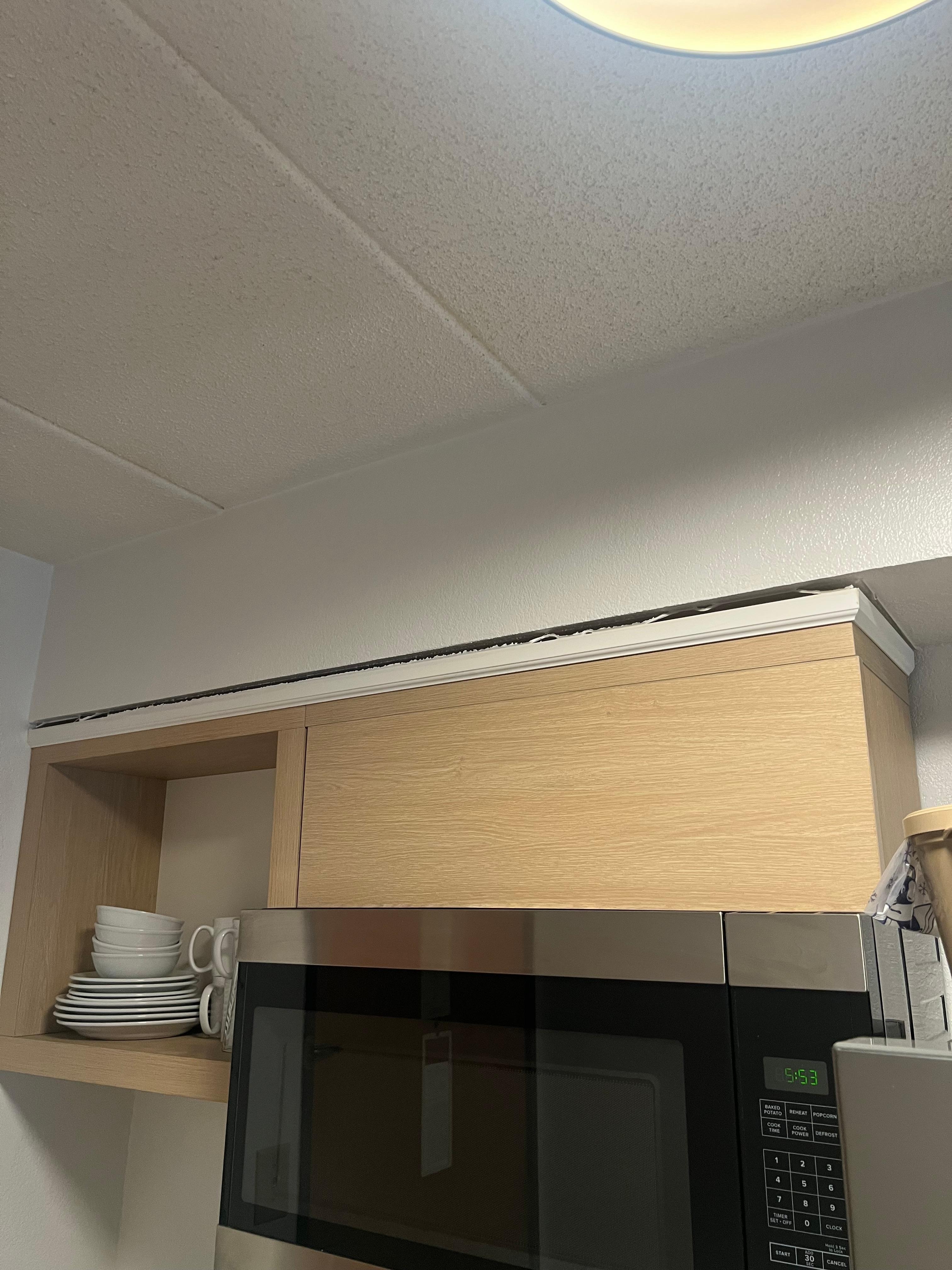 Cabinets pulling away from ceiling 