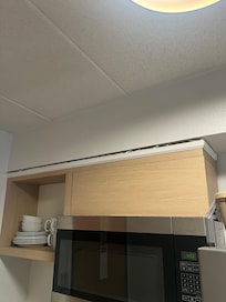Cabinets pulling away from ceiling