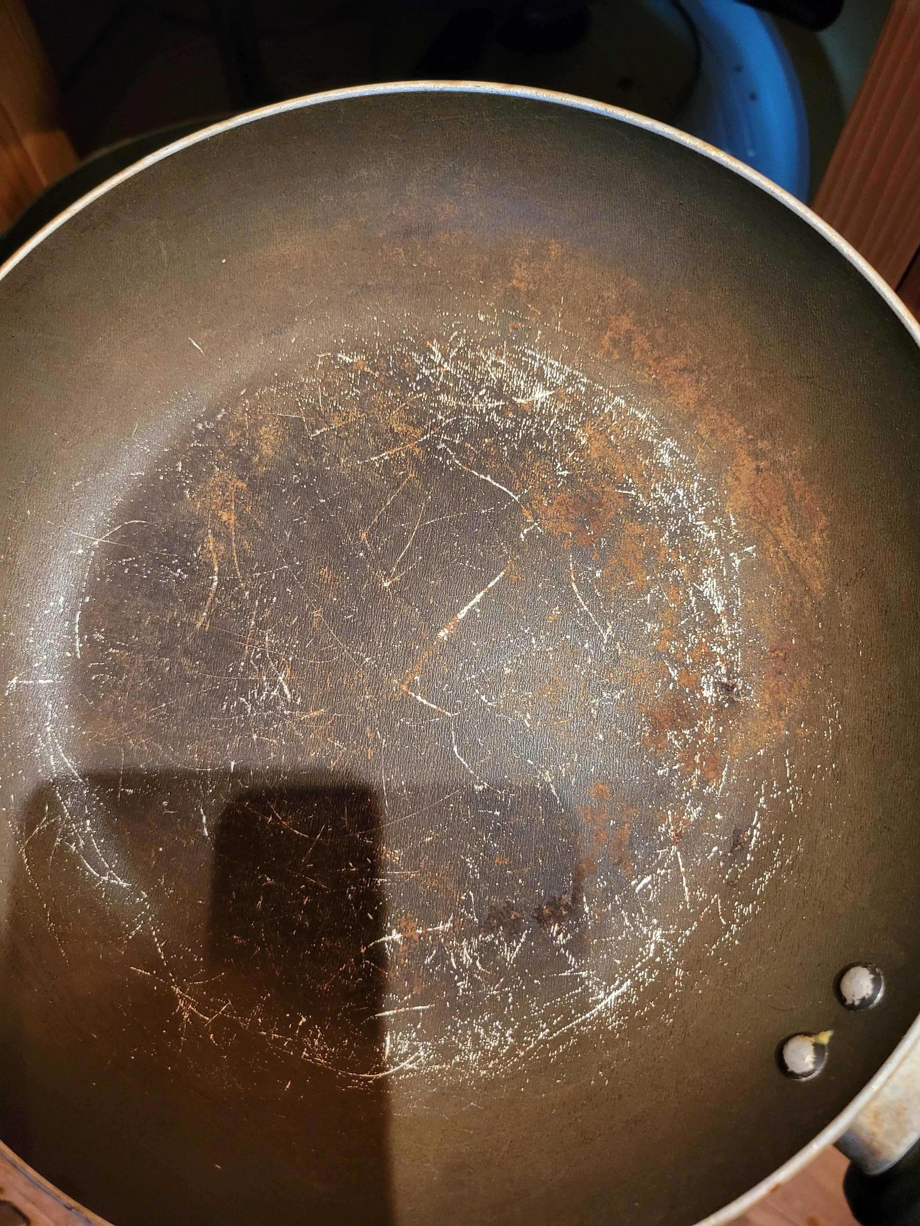 severely scratched pan